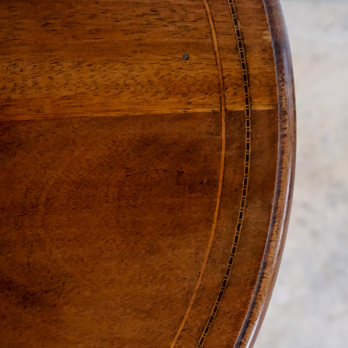 EDWARDIAN MAHOGANY AND LINE INLAID SIDE TABLE