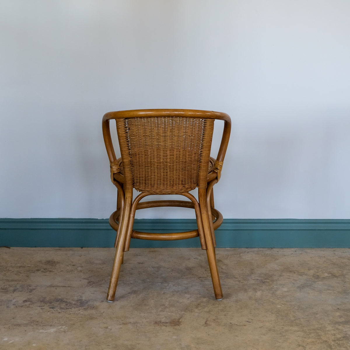 SMALL RATTAN BENTWOOD ARMCHAIR