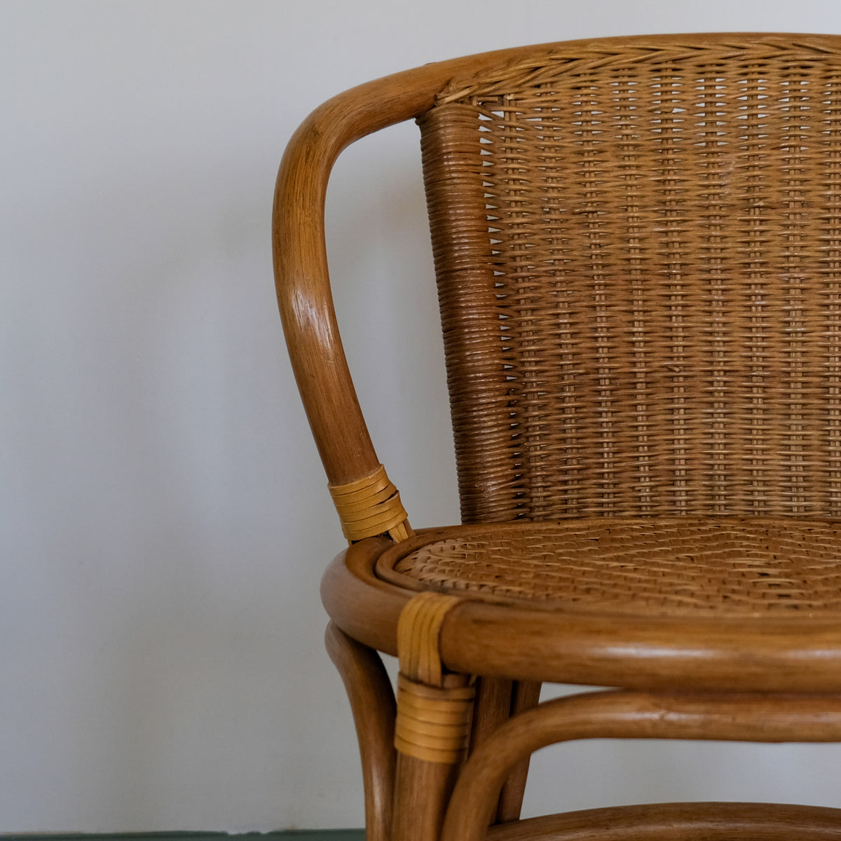 SMALL RATTAN BENTWOOD ARMCHAIR
