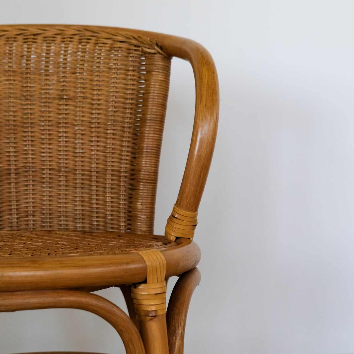 SMALL RATTAN BENTWOOD ARMCHAIR