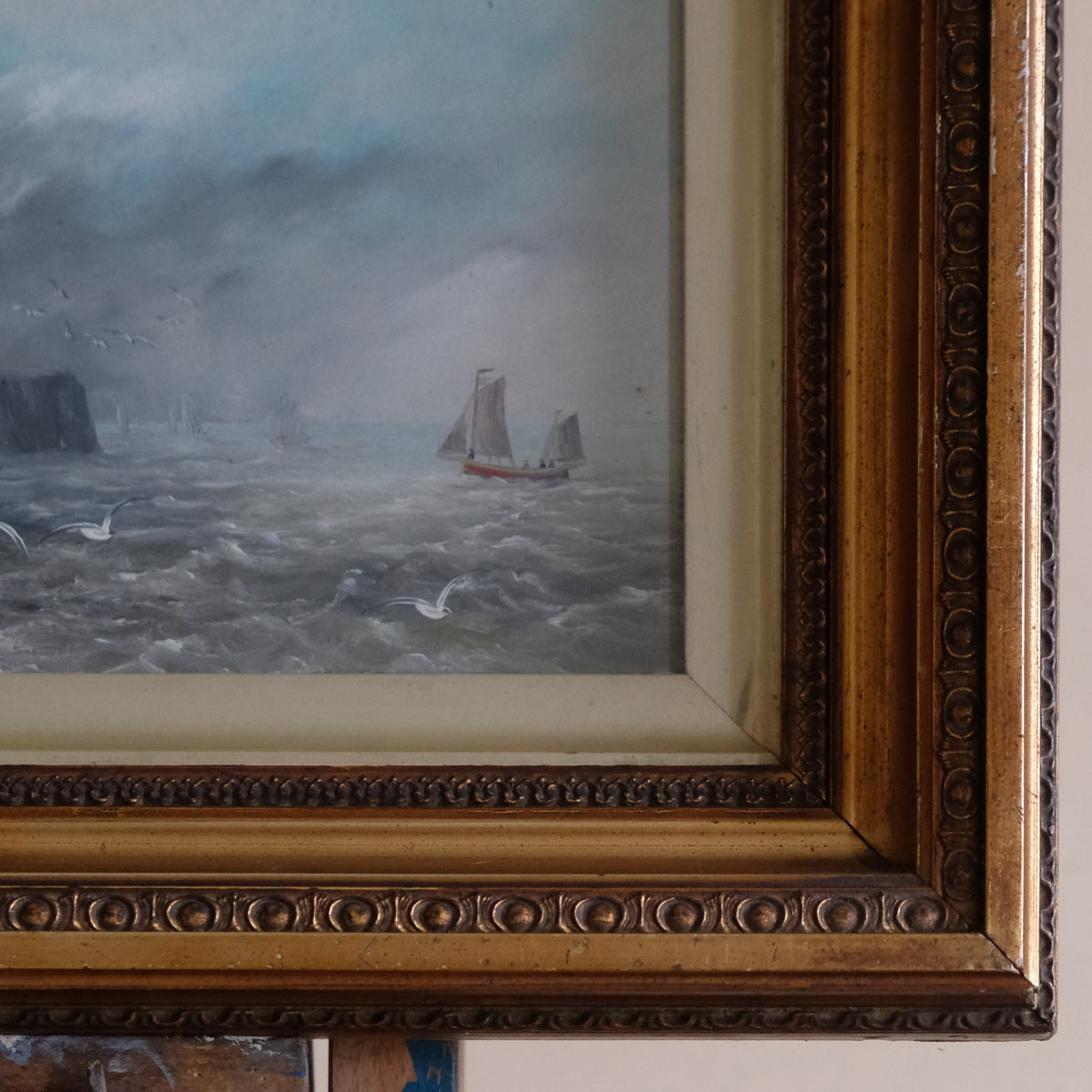 COASTAL SEASCAPE WITH SAILING BOAT