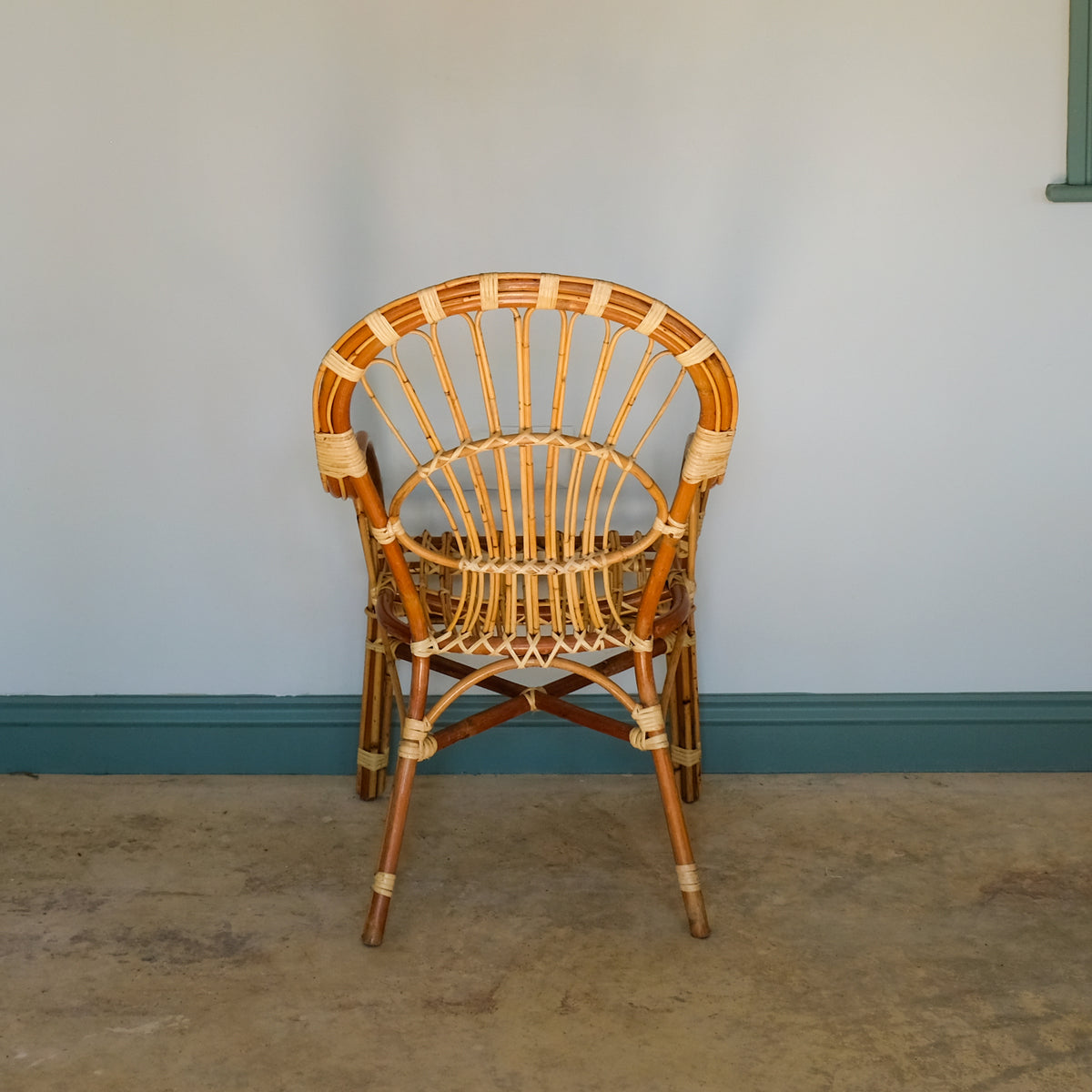MID CENTURY RATTAN ARMCHAIR