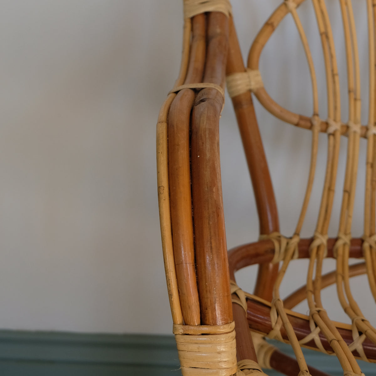 MID CENTURY RATTAN ARMCHAIR