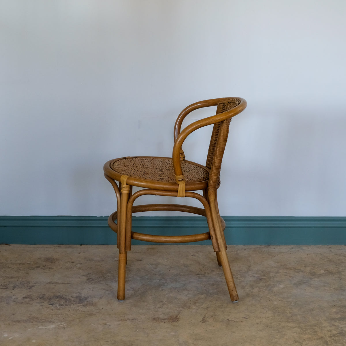 SMALL RATTAN BENTWOOD ARMCHAIR