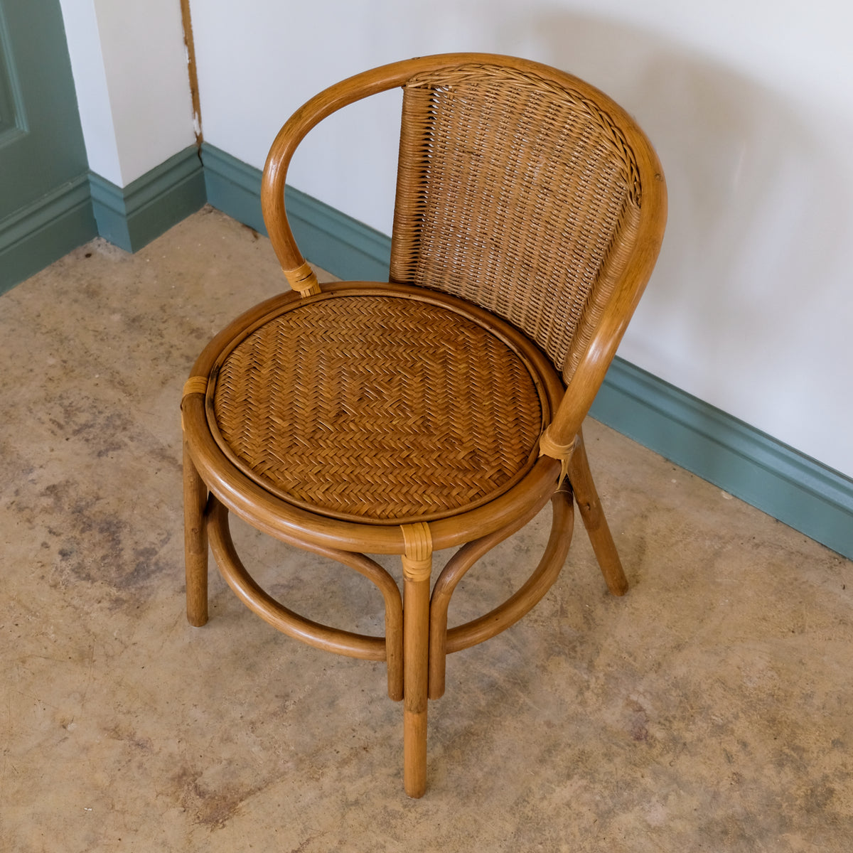 SMALL RATTAN BENTWOOD ARMCHAIR
