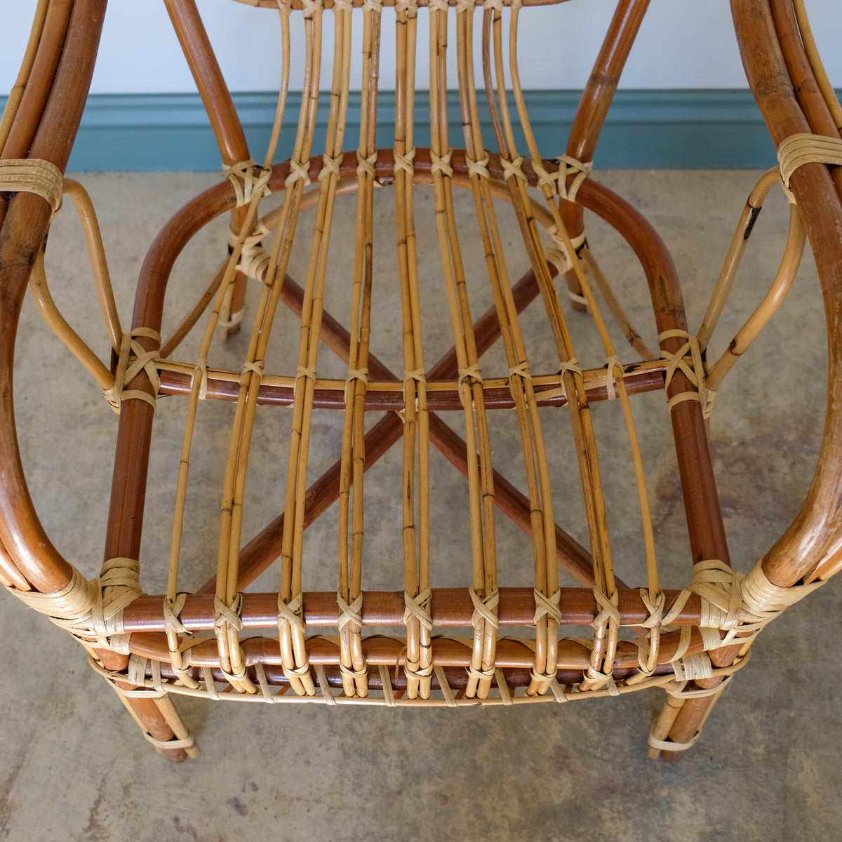 MID CENTURY RATTAN ARMCHAIR